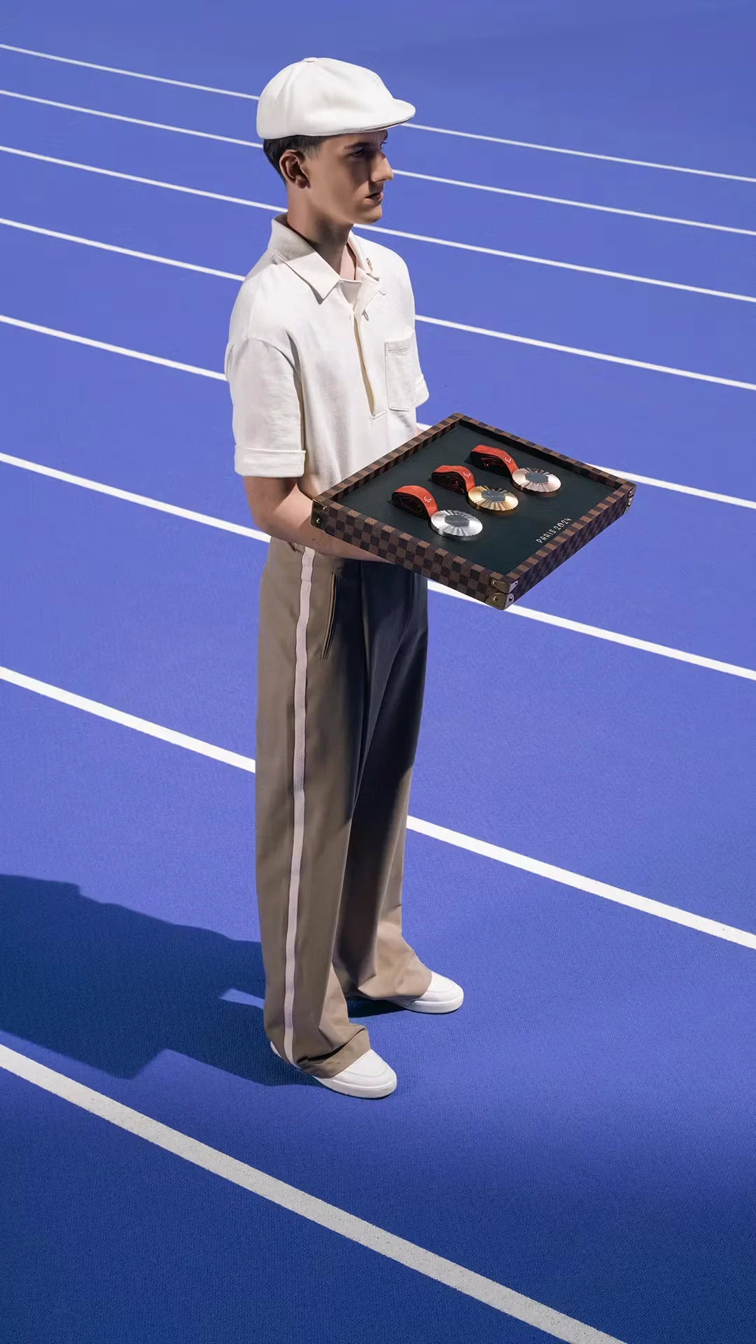 Volunteer medals bearers uniforms designed by Louis Vuitton, Olympic and Paralympic Games Paris 2024, LVMH, France